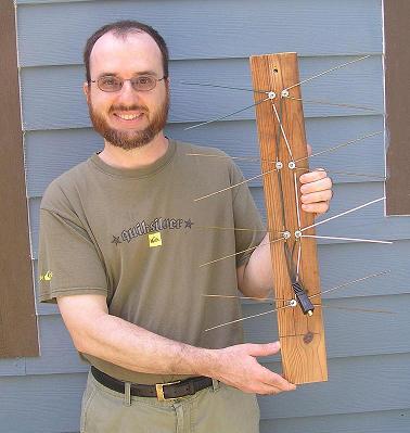 Don Cross holding his home-made HDTV antenna.